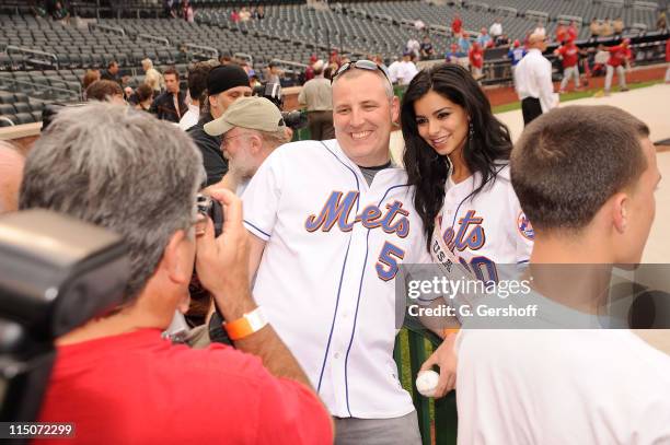 Miss USA Rima Fakih poses for pictures with fans at Citi Field on May 27, 2010 in the Queens Borough of New York City.