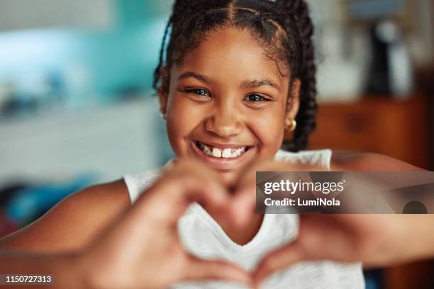 they fill your life with love and happiness - child love heart hands stock pictures, royalty-free photos & images