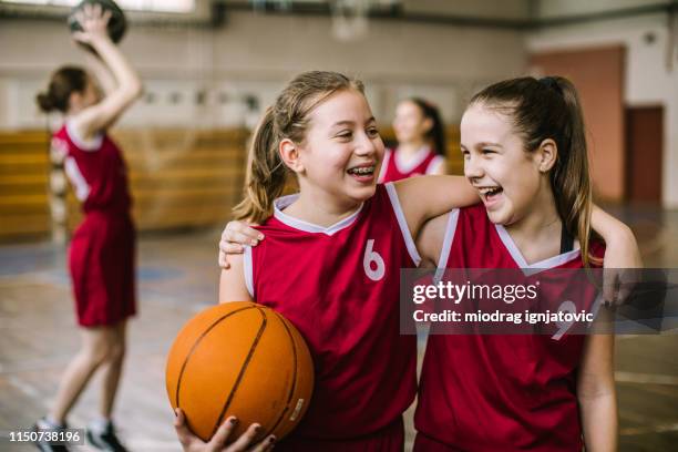 we should find the way to celebrate this win - girls basketball stock pictures, royalty-free photos & images