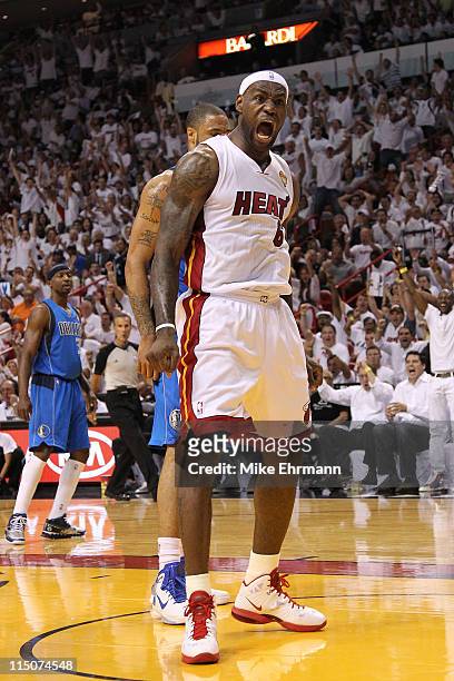 LeBron James of the Miami Heat reacts against the Dallas Mavericks in Game Two of the 2011 NBA Finals at American Airlines Arena on June 2, 2011 in...