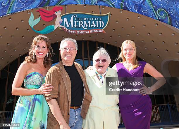 In this handout image provided by Disney Parks, Jodie Benson, Alan Menken, Pat Carroll and Sherie Rene Scott pose for photographers following the...