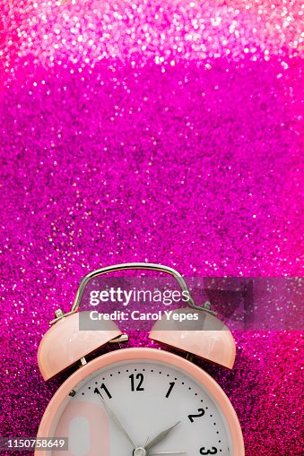 Pink Ringing Clock Pink Alarm Clock In Pink Glitter Background High-Res Stock Photo ...