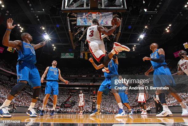 Dwyane Wade of the Miami Heat shoots against Tyson Chandler of the Dallas Mavericks during Game Two of the 2011 NBA Finals on June 2, 2011 at the...