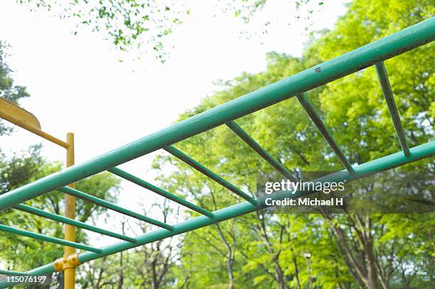 park playground equipment - monkey bars imagens e fotografias de stock