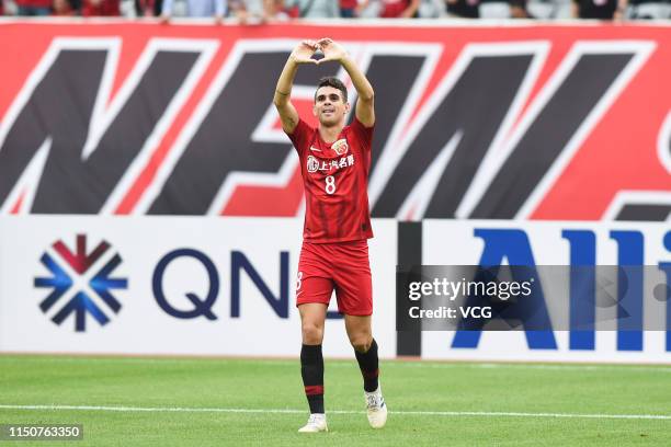 Oscar of Shanghai SIPG celebrates after scoring during the AFC Champions League Group H match between Shanghai SIPG and Ulsan Hyundai at Shanghai...