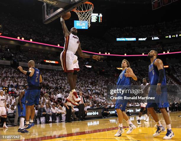 LeBron James of the Miami Heat dunks the ball in the third quarter while taking on the Dallas Mavericks in Game Two of the 2011 NBA Finals at...