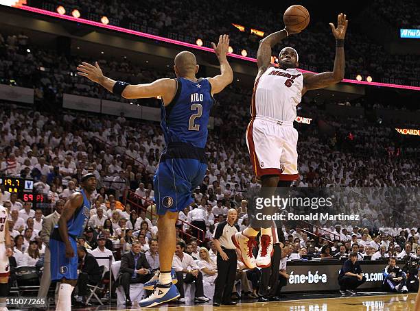 LeBron James of the Miami Heat dunks the ball in the third quarter over Jason Kidd of the Dallas Mavericks in Game Two of the 2011 NBA Finals at...