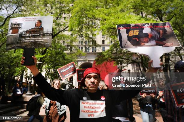 Protesters gather outside of Police Headquarters in Manhattan to protest during the police disciplinary hearing for Officer Daniel Pantaleo, who was...