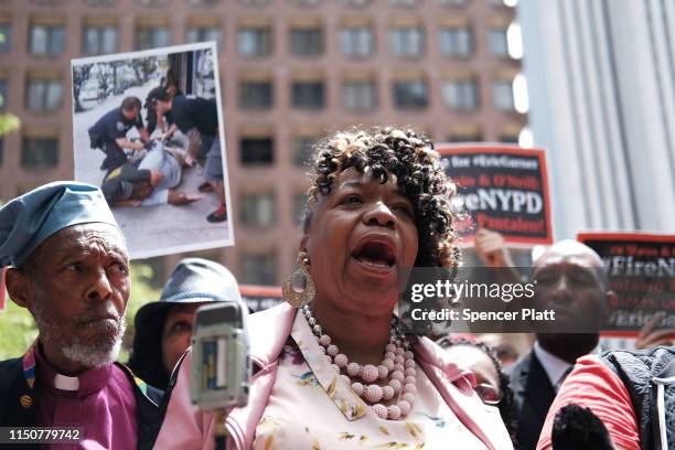 Gwen Carr, mother of Eric Garner, joins others during a news conference outside of Police Headquarters in Manhattan to protest during the police...