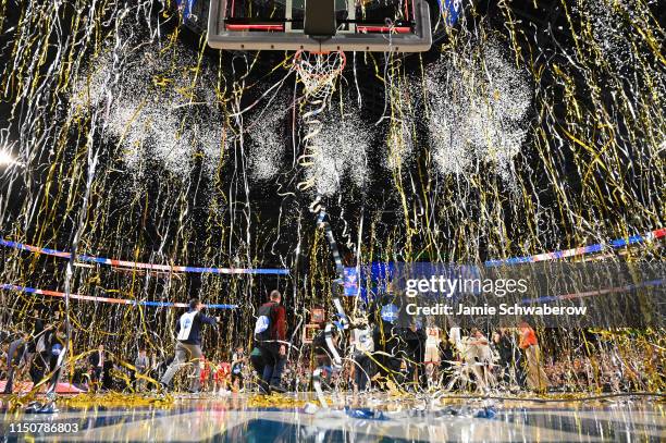 Confetti falls as the Virginia Cavaliers celebrate their victory over the Texas Tech Red Raiders during the 2019 NCAA Photos via Getty Images Men's...