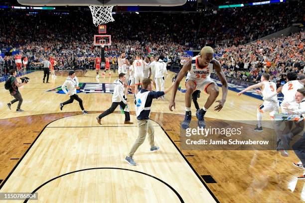 Mamadi Diakite of the Virginia Cavaliers celebrates after defeating the Texas Tech Red Raiders during the 2019 NCAA Photos via Getty Images Men's...