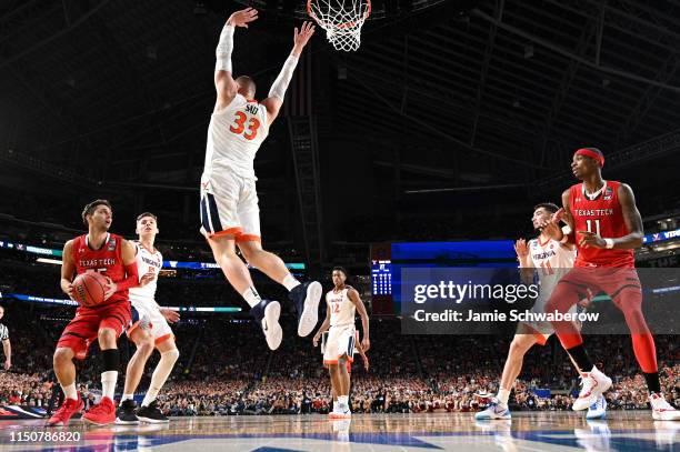 Jack Salt of the Virginia Cavaliers defends Davide Moretti of the Texas Tech Red Raiders during the 2019 NCAA Photos via Getty Images Men's Final...