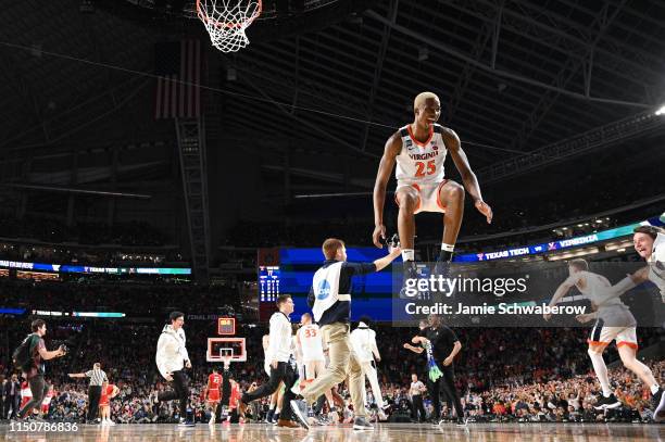 Mamadi Diakite of the Virginia Cavaliers celebrates after defeating the Texas Tech Red Raiders during the 2019 NCAA Photos via Getty Images Men's...