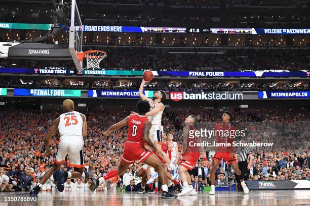 Ty Jerome of the Virginia Cavaliers drives to the hoop against the Texas Tech Red Raiders during the 2019 NCAA Photos via Getty Images Men's Final...