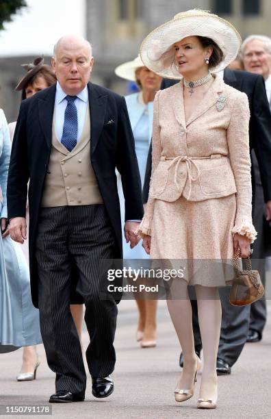 Lord Julian Fellowes and Emma Joy Kitchener attend the wedding of Lady Gabriella Windsor and Thomas Kingston at St George's Chapel on May 18, 2019 in...