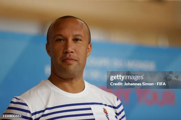 Legend Mikael Silvestre welcomes children at the Lionel Terray school at Echirolles during the FIFA Women's World Cup France 2019 National Trophy...