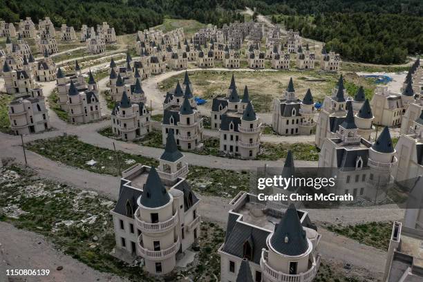 Hundreds of castle-like villas and houses are seen unfinished at the Burj Al Babas housing development on May 21, 2019 in Mudurnu, Turkey....