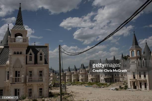 Hundreds of castle-like villas and houses are seen unfinished at the Burj Al Babas housing development on May 21, 2019 in Mudurnu, Turkey....