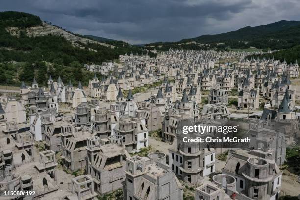 Hundreds of castle-like villas and houses are seen unfinished at the Burj Al Babas housing development on May 21, 2019 in Mudurnu, Turkey....