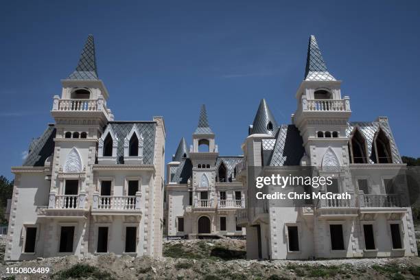 Hundreds of castle-like villas and houses are seen unfinished at the Burj Al Babas housing development on May 21, 2019 in Mudurnu, Turkey....