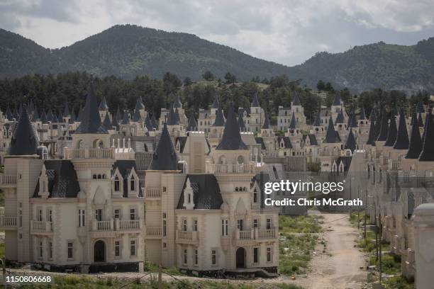 Hundreds of castle-like villas and houses are seen unfinished at the Burj Al Babas housing development on May 21, 2019 in Mudurnu, Turkey....