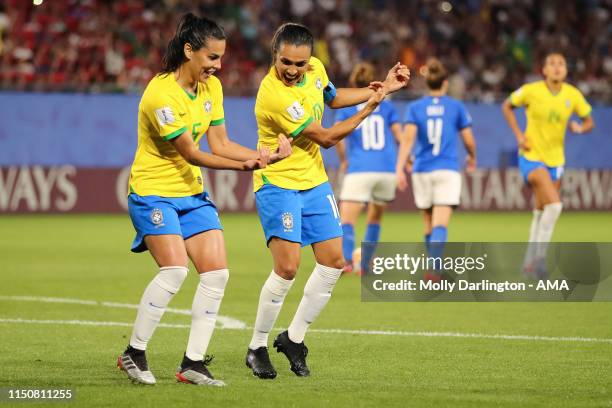 Marta of Brazil celebrates with Thaisa of Brazil after scoring a goal to make it 0-1 during the 2019 FIFA Women's World Cup France group C match...