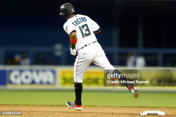 Starlin Castro of the Miami Marlins rounds the bases after hitting a home run against the New York Mets at Marlins Park on April 02, 2019 in Miami,...
