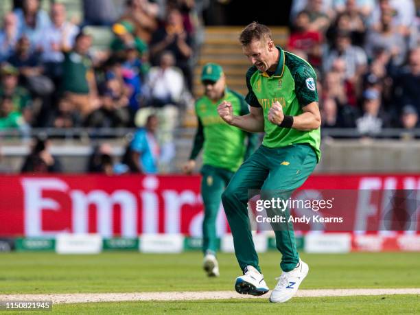 Chris Morris of South Africa celebrates after taking the wicket of Jimmy Neesham of New Zealand during the Group Stage match of the ICC Cricket World...