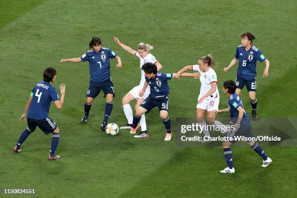 Emi Nakajima of Japan and Nana Ichise of Japan battle with Ellen White of England and Georgia Stanway of England during the 2019 FIFA Women's World...