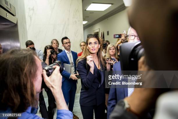 Hope Hicks, former White House communications director, center, leaves following a closed-door interview with the House Judiciary Committee in...