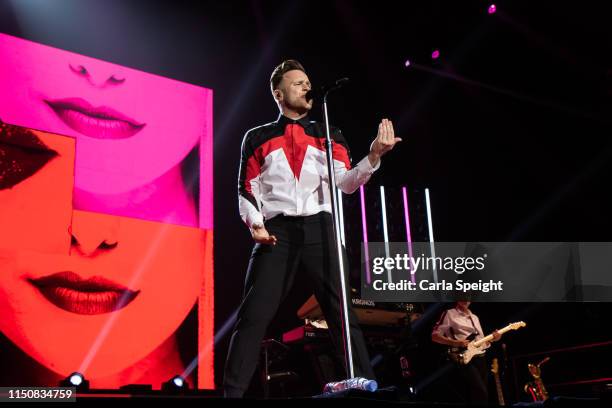 Olly Murs perform on stage at Bonus Arena on May 21, 2019 in Hull, England.