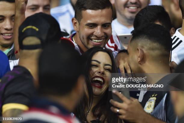 Paraguay's model Larissa Riquelme is pictured during the Copa America football tournament group match between Argentina and Paraguay at the Mineirao...