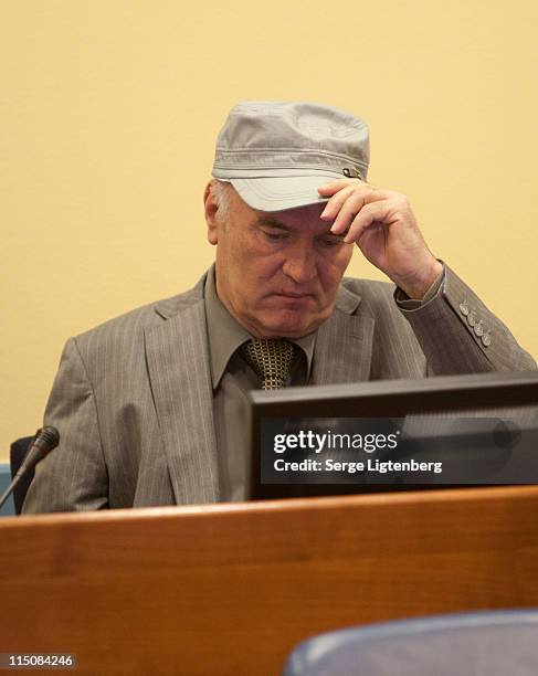 Former Bosnian Serb Military Leader Ratko Mladic takes his seat in the International Criminal Tribunal to face war crime charges on June 3, 2011 in...