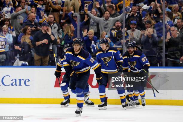 Brayden Schenn of the St. Louis Blues celebrates with teammates after scoring a goal on Martin Jones of the San Jose Sharks during the second period...