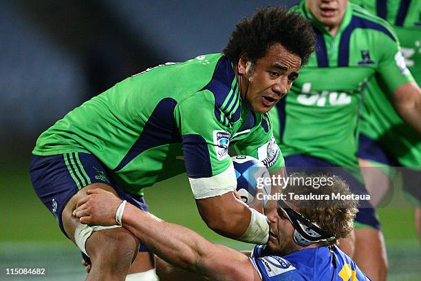 Nasi Manu of the Highlanders is tackled during the round 16 Super Rugby match between the Highlanders and the Force at Carisbrook on June 3, 2011 in...