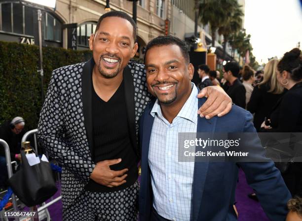 Will Smith and Alfonso Ribeiro attends the premiere of Disney's "Aladdin" at El Capitan Theatre on May 21, 2019 in Los Angeles, California.