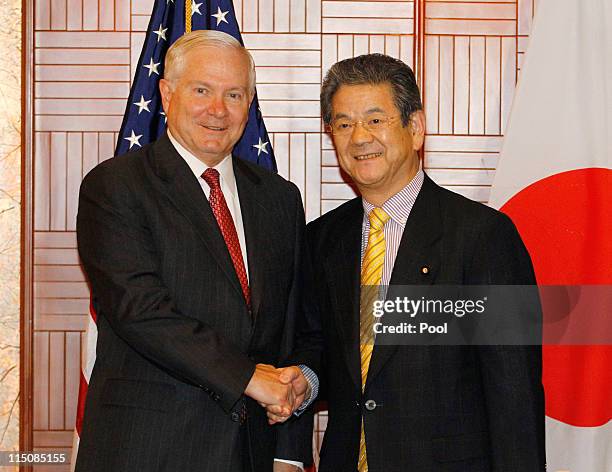 Secretary of Defense Robert Gates shakes hands with Japan's Defence Minister Toshimi Kitazawa at the 10th International Institute for Strategic...