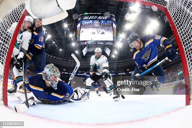 Colton Parayko of the St. Louis Blues falls to the ice against the San Jose Sharks during the second period in Game Six of the Western Conference...