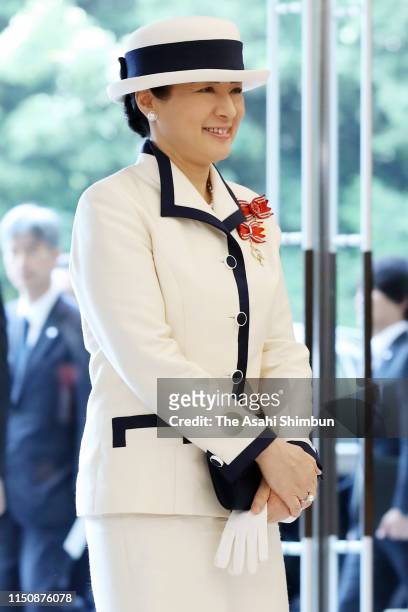 Empress Masako is seen on arrival at the Meiji Jingu Kaikan for the Japan Red Cross Society annual meeting, her first solo official duty, on May 22,...