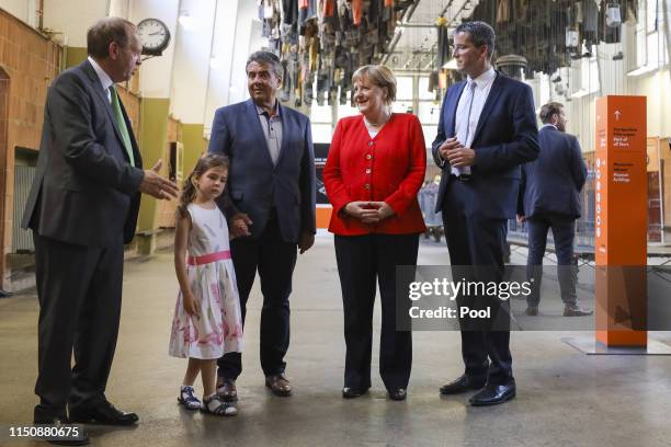 German Chancellor Angela Merkel tours a former silver mine during her visit to the UNESCO World Heritage Town of Goslar on June 19, 2019 in Goslar,...