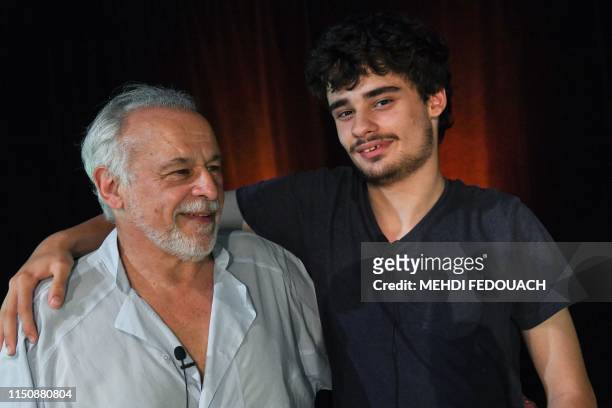 French actor Francis Perrin and his autistic son Louis, pose during a rehearsal of 'Portrait of Moliere in 50mn', at the Don Bosco Institute on June...