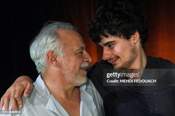 French actor Francis Perrin and his autistic son Louis, pose during a rehearsal of 'Portrait of Moliere in 50mn', at the Don Bosco Institute on June...