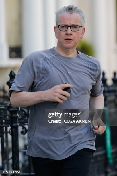 Britain's Environment, Food and Rural Affairs Secretary and Conservative leadership contender Michael Gove goes for a morning jog in London on June...