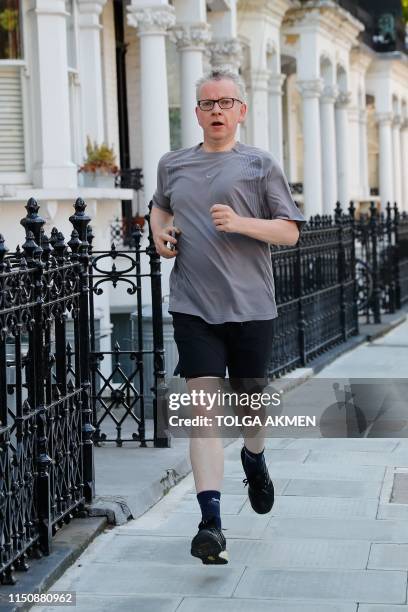 Britain's Environment, Food and Rural Affairs Secretary and Conservative leadership contender Michael Gove goes for a morning jog in London on June...