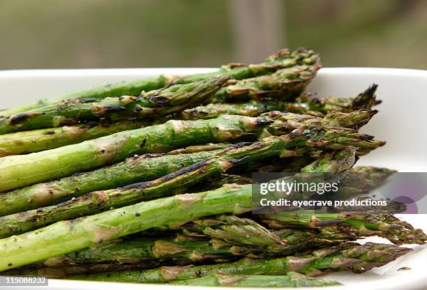 grilled asparagus dish - cooked asparagus stock pictures, royalty-free photos & images