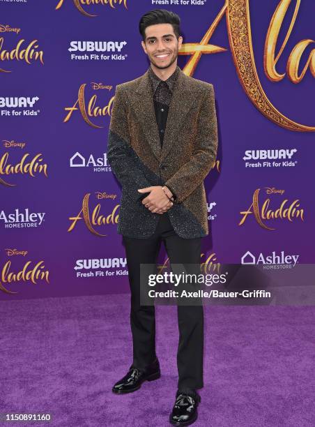 Mena Massoud attends the premiere of Disney's "Aladdin" on May 21, 2019 in Los Angeles, California.