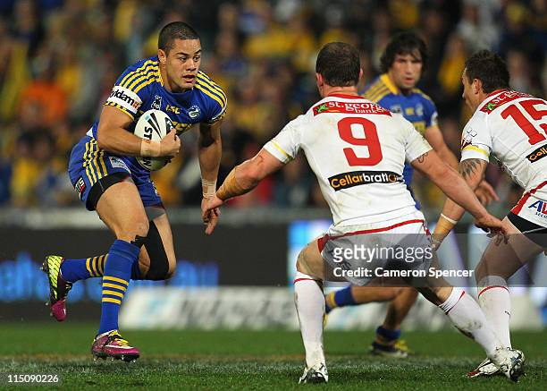 Jarryd Hayne of the Eels runs the ball during the round 13 NRL match between the Parramatta Eels and the St George Illawarra Dragons at Parramatta...