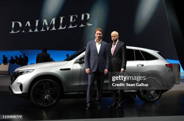 Dieter Zetsche , Chairman of Daimler AG, and Ola Källenius, who will succeed Zetsche, pose for photographers at the annual Daimler AG shareholders...