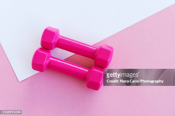 pair of dumbbell - little effort stock pictures, royalty-free photos & images