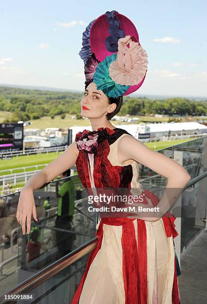 Model Erin O'Connor poses wearing a hat by Louis Mariette and a bespoke dress by Felicity Brown created for this occasion attends Investec Ladies Day...